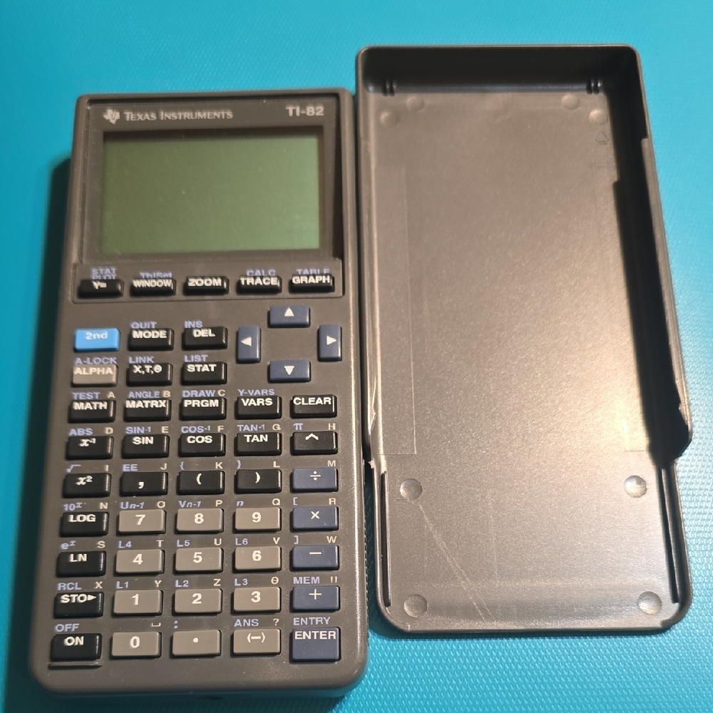Texas Instruments TI-82 Graphing Calculator - Black and Gray